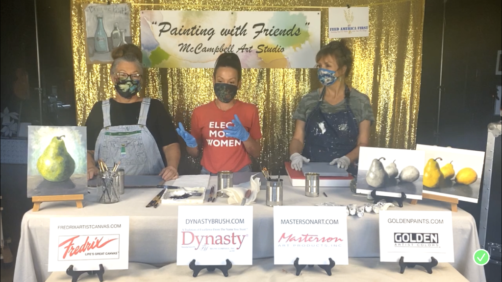 A picture of three women about to paint